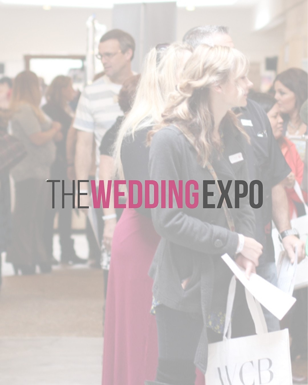 Wedding expo attendees exploring vendor options.