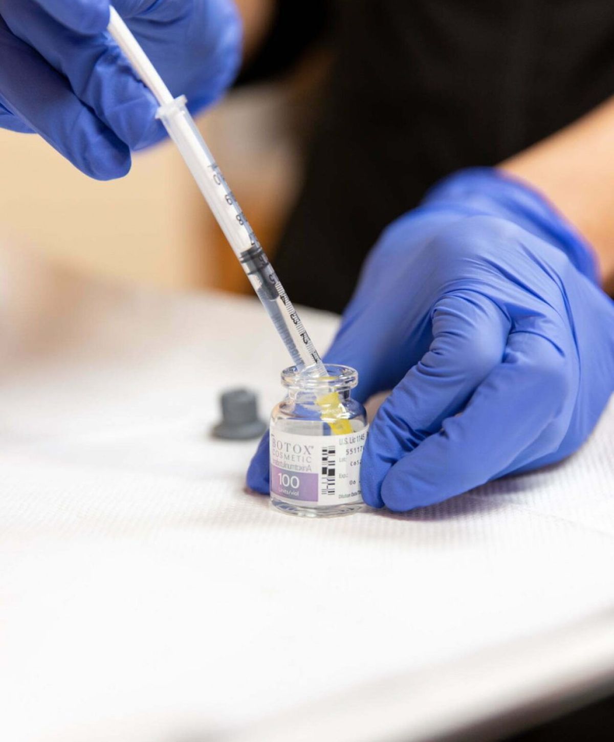 refilling syringe with botox