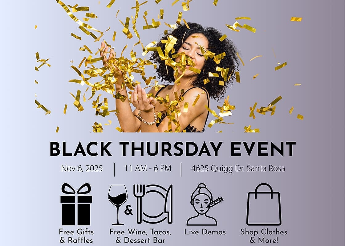 Celebratory woman throwing confetti at event.